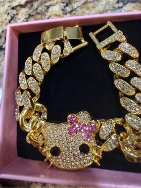 Gold-Tone Crystal Hello Kitty Style Bracelet with Pink Bow Accent